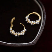 Women Twisted Earrings with Ball Detail - 1 Pair