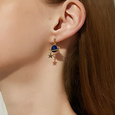 Women’s Earrings Featuring Astronaut and Planet Design - Pair