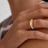 Women's Statement Ring Showcasing Overlapping Double Band and Tube Style