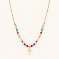 Women’s Cross Pendant Necklace with Pearl Strand and Decorative Stone Details