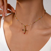 Women’s Cross Necklace with Vibrant Stone Details