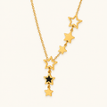 Women's Star Necklace with Multiple Charms and Asymmetrical Star Design