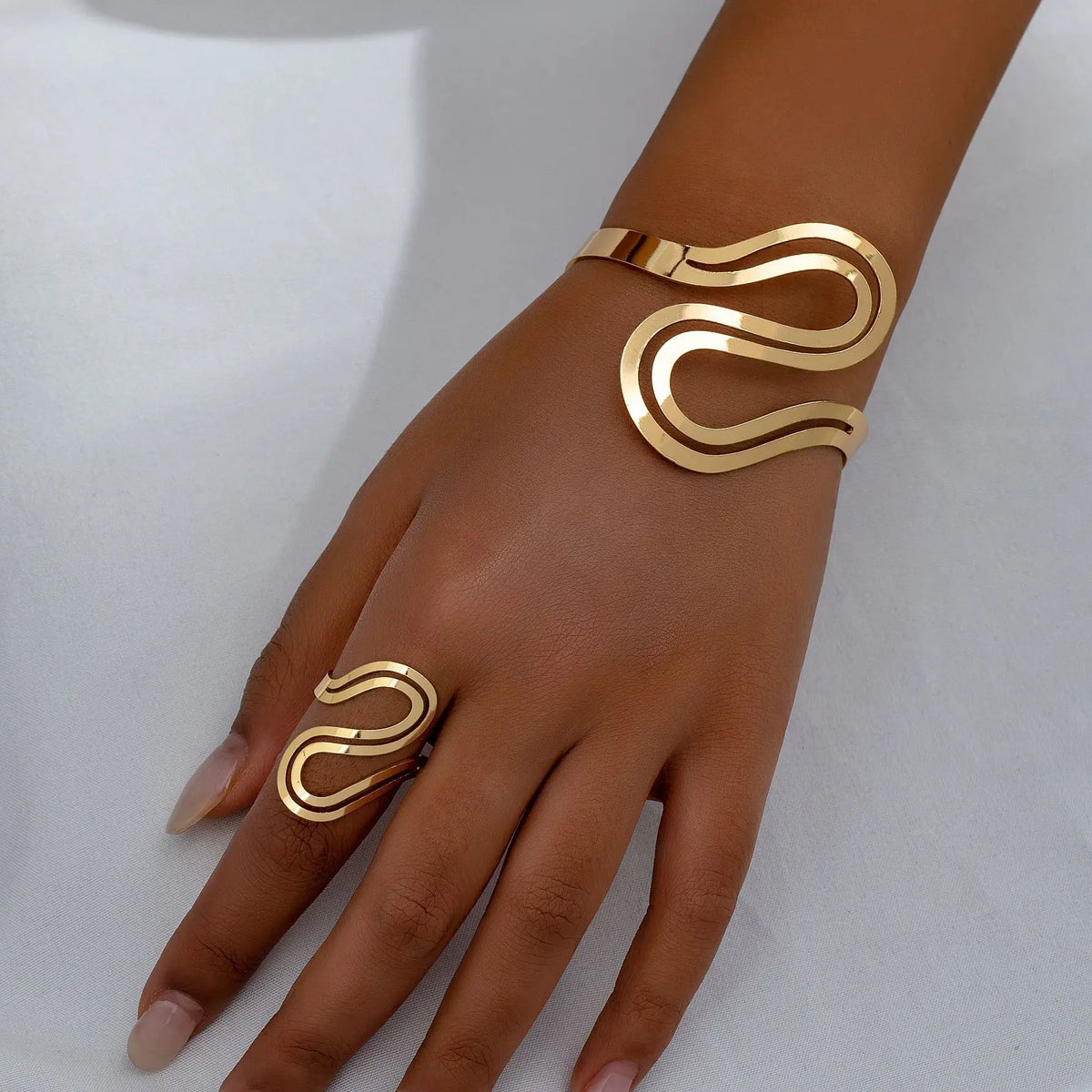 Women's Adjustable Bracelet and Ring Set with Modern Swirl Design