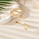 Women's Adjustable Bracelet and Ring Set with Modern Swirl Design