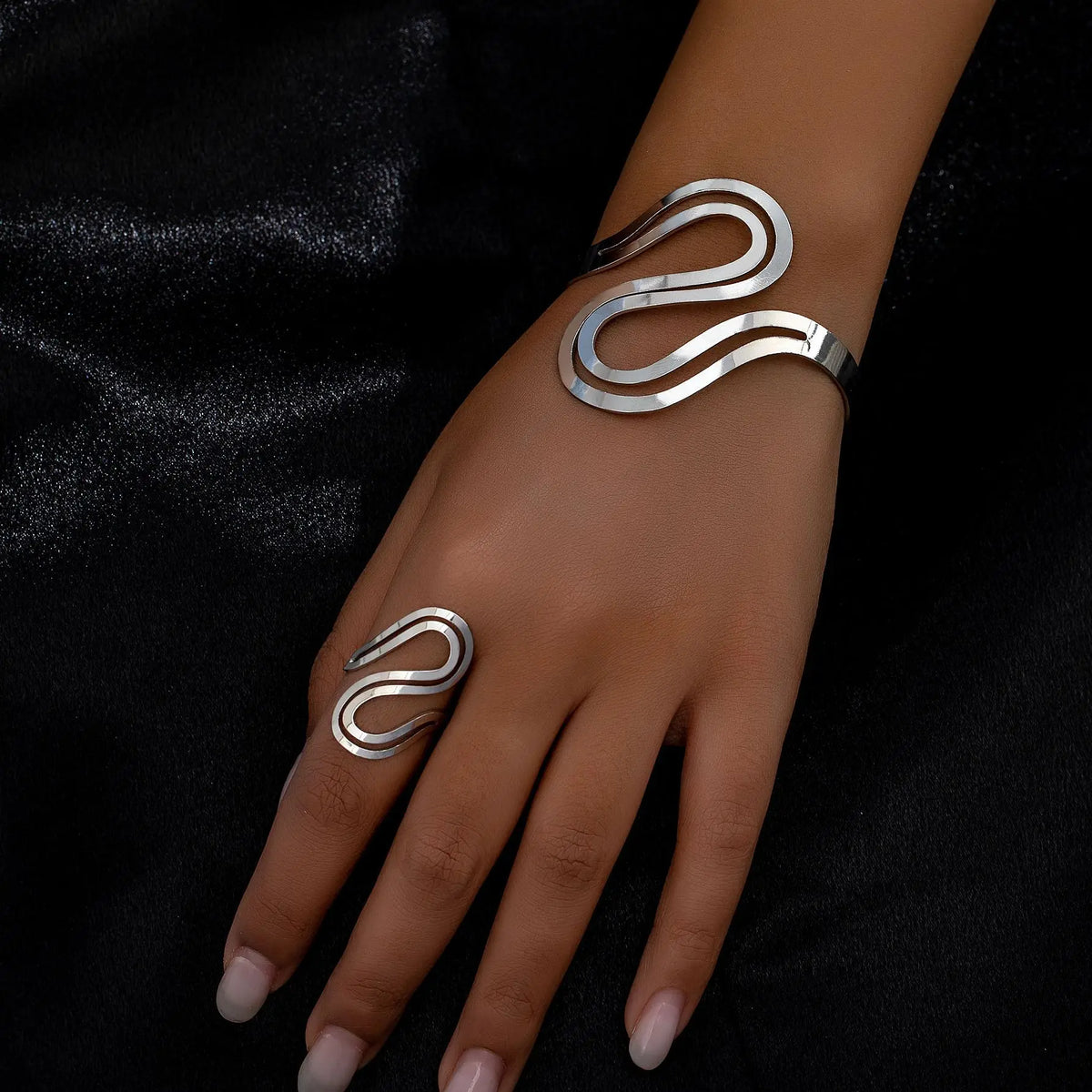 Women's Adjustable Bracelet and Ring Set with Modern Swirl Design