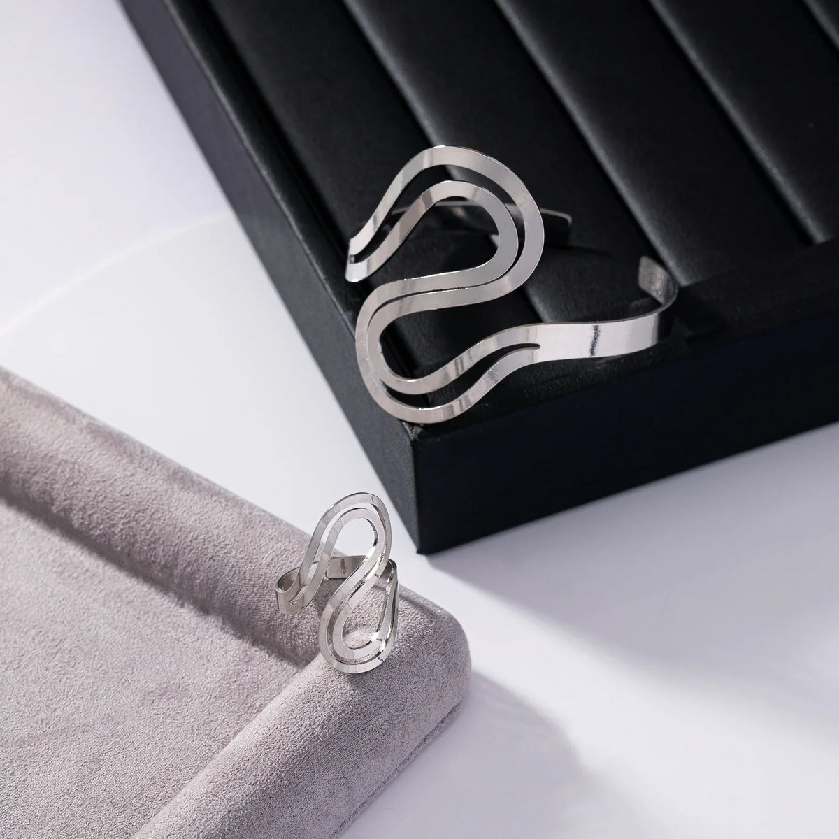 Women's Adjustable Bracelet and Ring Set with Modern Swirl Design