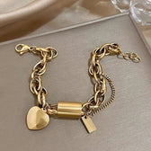 Women's Statement Chain Bracelet With Heart Charms and Multi-Layered Chain Features
