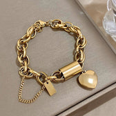 Women's Statement Chain Bracelet With Heart Charms and Multi-Layered Chain Features