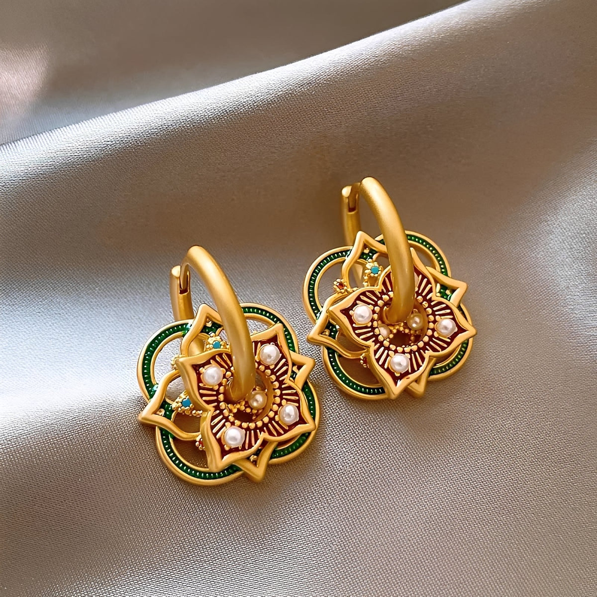 Women's Jhumka Earrings with Geometric Rangoli Design and Ornamental Details