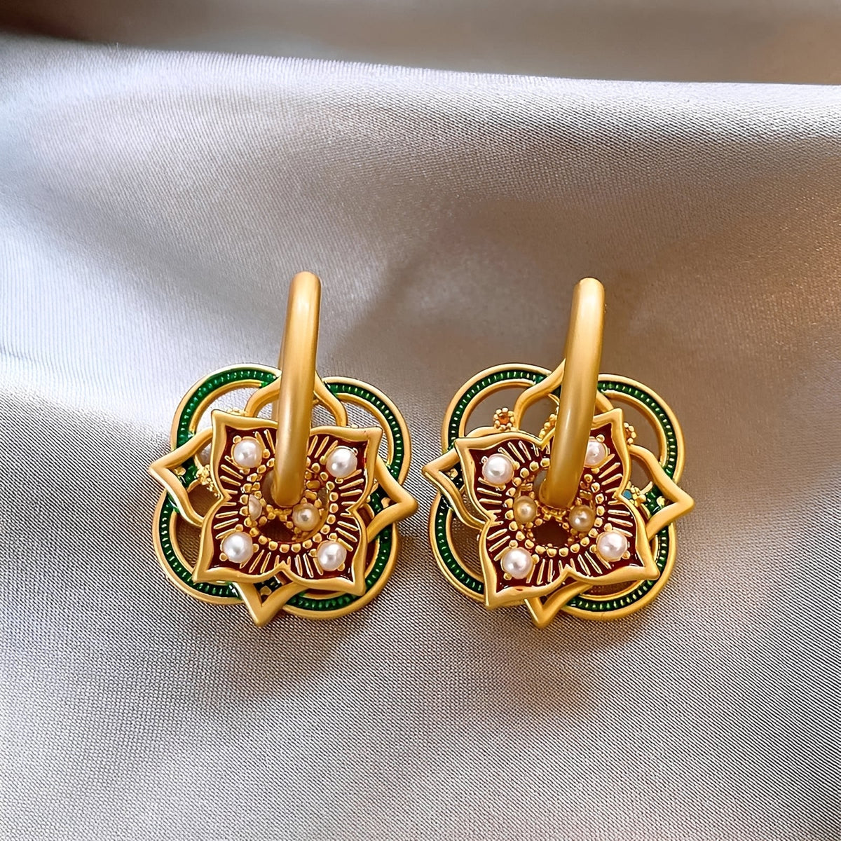 Women's Jhumka Earrings with Geometric Rangoli Design and Ornamental Details