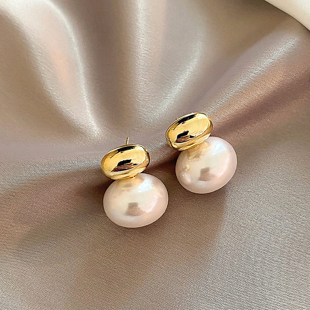Women's Ear Studs with Smooth Oval Pearl Detail and Dual Design