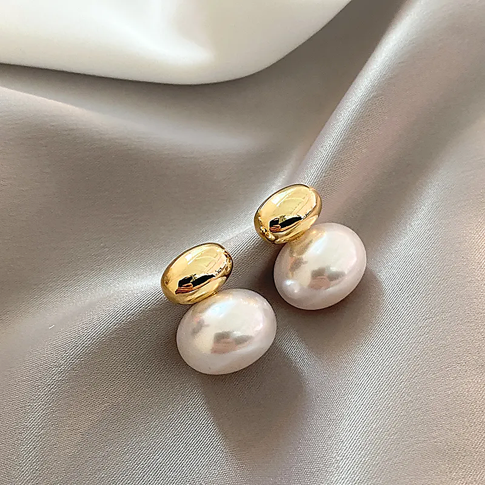 Women's Ear Studs with Smooth Oval Pearl Detail and Dual Design