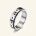 Ladies spinning ring with moon and star and movable design