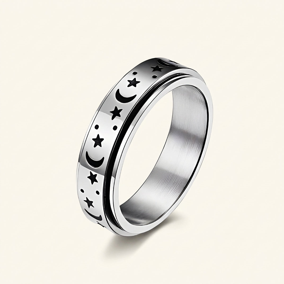 Ladies spinning ring with moon and star and movable design