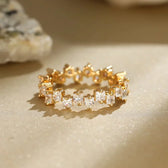 Women's Ring with Scattered Square Stone Accents and Offset Design
